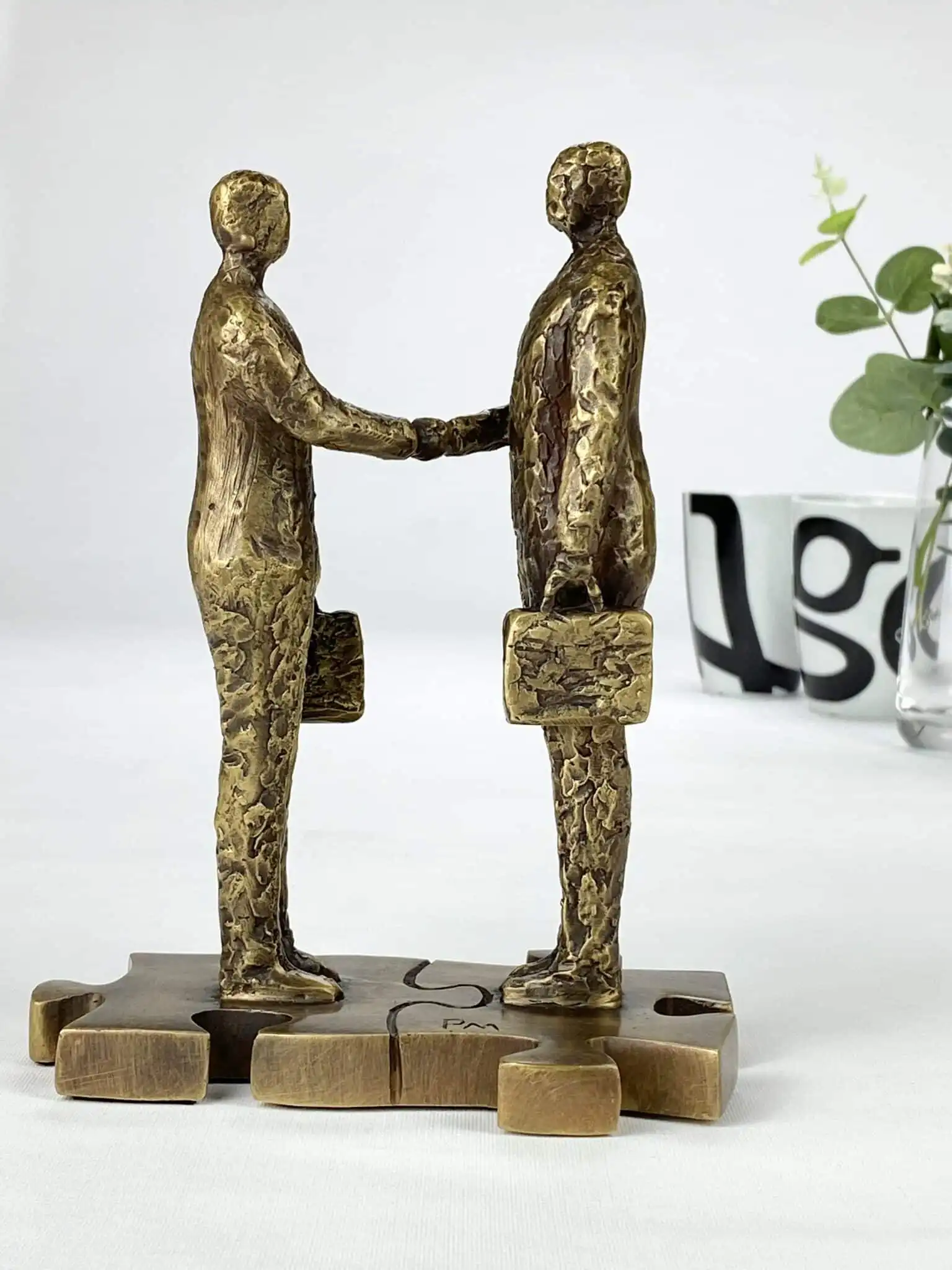 Samspil bronzeskulptur (det gode samarbejde)