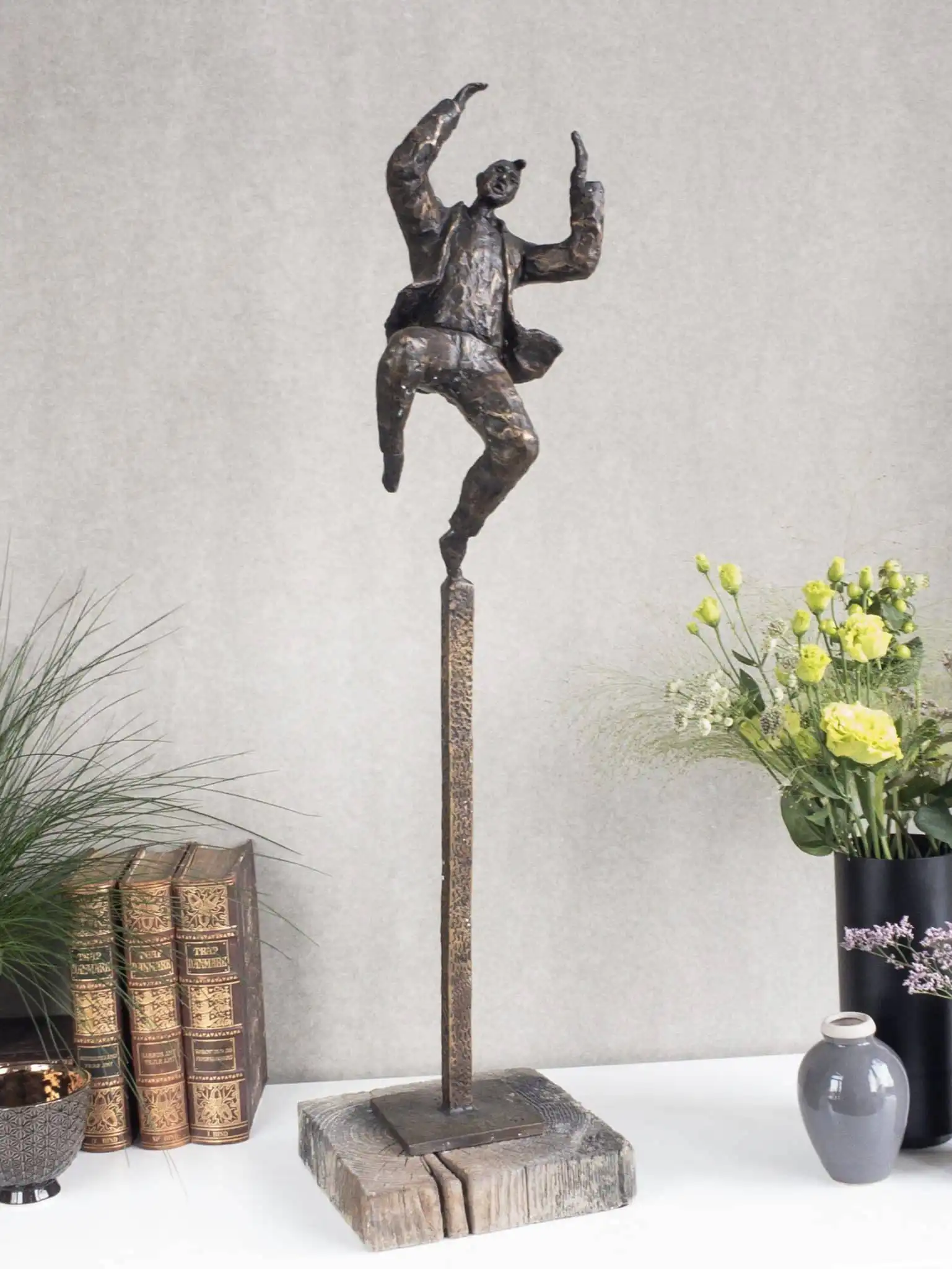 Optimisten bronzeskulptur (positivt livssyn)